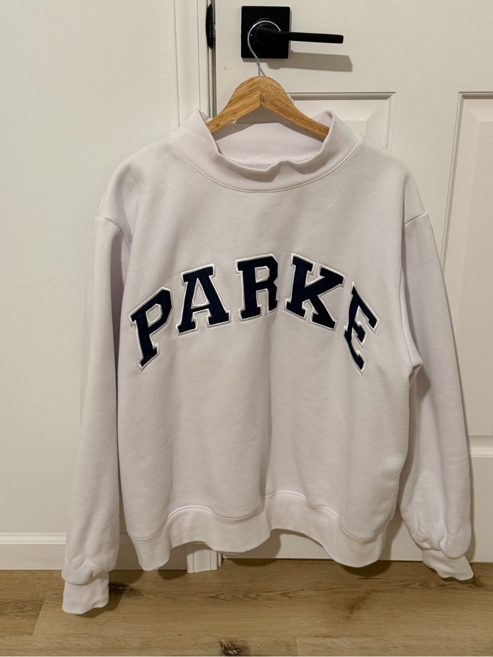 PARK White Turtleneck Sweatshirt with Navy Appliqué